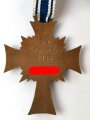 Ehrenkreuz der Deutschen Mutter ( Mutterkreuz ) in Bronze mit Verleihungstüte, diese Rückseitig mit Hersteller Wilhelm Jäger, Frankfurt, Tüte mit Beschädigungen