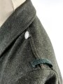 Feldbluse für einen Angehörigen der Waffen SS. " Zweiloch, getragenes Kammerstück in gutem Gesamtzustand, kein Abdruck des Adlers erkennbar