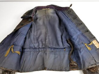 Luftwaffe, braune Lederjacke für Jagdflieger ( sogenannte Reichsverteidigungsjacke ). Getragenes Stück in  gutem Zustand, Das Etikett mit Reichsbetriebsnummer datiert 1944