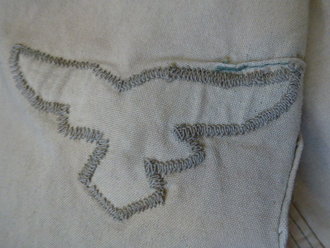 Tarnfeldbluse der Luftwaffen Felddivisionen, verblasstes Sumpftarn, der Adler Originalvernäht, keine erkennbare Stempelung, wohl gewaschen- leuchtet aber nicht