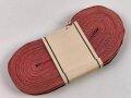 Bündel Ordensband  für die Bandspange zur Kriegsverdienstmedaille 1939.  15mm Breite. In der originalen Banderole, laut dieser 25 Meter
