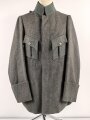 1. Weltkrieg, Feldbluse Modell 1915 für Mannschaften, während des Krieges zum Offiziersrock geändert. So getragenes Stück in gutem Gesamtzustand, Ordenschlaufe für EK1