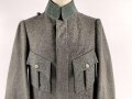 1. Weltkrieg, Feldbluse Modell 1915 für Mannschaften, während des Krieges zum Offiziersrock geändert. So getragenes Stück in gutem Gesamtzustand, Ordenschlaufe für EK1