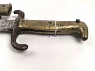 Kaiserreich, Seitengewehr Modell 1871, nummerngleich,  Herstellermarke W.R.Kirschbaum, Scheidenspitze abgebrochen und beiliegend. Ungereinigtes Stück