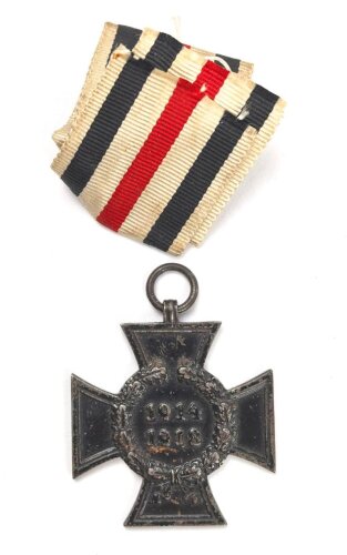 Ehrenkreuz für Witwen und Waisen, Hersteller R.V. 38 Pforzheim, Band beiliegend