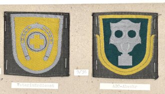 Finnland, Sammlung Ärmelabzeichen, auf Karton getackert