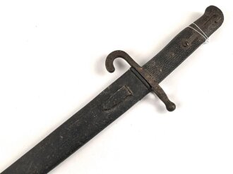 Österreich, Jatagan Seitengewehr Werndl Modell 1867, zum Infanterie- und Jägergewehr M1867/77., mit Abnahmemarke in Form des Doppeladlers, Herstellermarken auf der Klinge  und weitere Marken auf der Parierstange, ungereinigt,