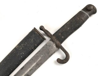 Österreich, Jatagan Seitengewehr Werndl Modell 1867, zum Infanterie- und Jägergewehr M1867/77., mit Abnahmemarke in Form des Doppeladlers, Herstellermarken auf der Klinge  und weitere Marken auf der Parierstange, ungereinigt,