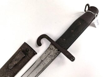 Österreich, Jatagan Seitengewehr Werndl Modell 1873, zum Infanterie- und Jägergewehr M1867/77., mit Abnahmemarke in Form des Doppeladlers, Herstellermarken auf der Klinge  und weitere Marken auf der Parierstange, ungereinigt,
