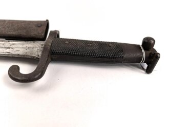 Österreich, Jatagan Seitengewehr Werndl Modell 1873, zum Infanterie- und Jägergewehr M1867/77., mit Abnahmemarke in Form des Doppeladlers, Herstellermarken auf der Klinge  und weitere Marken auf der Parierstange, ungereinigt,