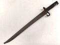 Österreich, Jatagan Seitengewehr Werndl Modell 1873, zum Infanterie- und Jägergewehr M1867/77., mit Abnahmemarke in Form des Doppeladlers, Herstellermarken auf der Klinge  und weitere Marken auf der Parierstange, ungereinigt,