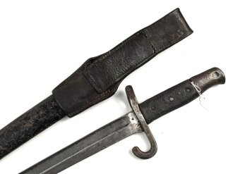 Österreich, Seitengewehr Modell 1870, ungereinigt, mit Koppelschuh, Herstellermarke auf Klingenansatz, Drückerfede bzw Drückerknopf entfernt und mit Zinn ausgefüllt,