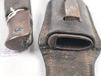 Österreich, Seitengewehr Modell 1870, ungereinigt, mit Koppelschuh, Herstellermarke auf Klingenansatz, Drückerfede bzw Drückerknopf entfernt und mit Zinn ausgefüllt,