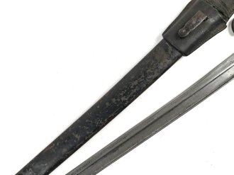 Österreich, Seitengewehr Modell 1870, ungereinigt, mit Koppelschuh, Herstellermarke auf Klingenansatz, Drückerfede bzw Drückerknopf entfernt und mit Zinn ausgefüllt,