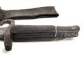 Österreich, Seitengewehr Modell 1870, ungereinigt, mit Koppelschuh, Herstellermarke auf Klingenansatz, Drückerfede bzw Drückerknopf entfernt und mit Zinn ausgefüllt,