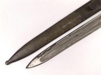 Österreich, Seitengewehr  Modell 1895 Mannlicher  für Stutzen, Eigentumstück,  Portepeeöse fehlt, Hersteller FGGY, Spitze der Klinge um ca 2 cm gekürz, Drücker fest