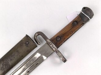 Österreich, Seitengewehr  Modell 1895 Mannlicher  für Stutzen, Eigentumstück,  Portepeeöse fehlt, Hersteller FGGY, Spitze der Klinge um ca 2 cm gekürz, Drücker fest