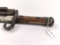 Österreich, Seitengewehr  Modell 1895 Mannlicher  für Stutzen, Eigentumstück,  Portepeeöse fehlt, Hersteller FGGY, Spitze der Klinge um ca 2 cm gekürz, Drücker fest
