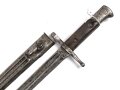 Italien, Seitengewehr Modell Carcano 1891 , Stahlscheide mit Sicken, offene Lötstelle ca 12 cm , Griffschale an der Vernietung ausgebrochen ,aber fest