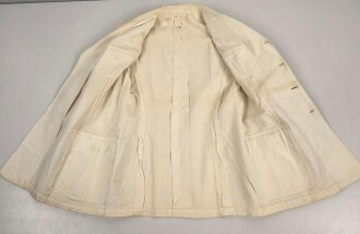 Kriegsmarine, weisses Jackett für einen Offizier. Stockfleckig, sonst guter Zustand, Eigentumsvermerk " Barnhäuser"