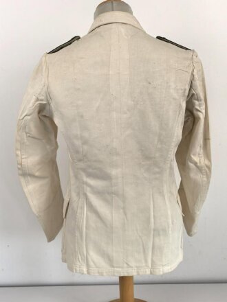 Kriegsmarine, weisses Jackett für einen Offizier. Stockfleckig, sonst guter Zustand, Eigentumsvermerk " Barnhäuser"