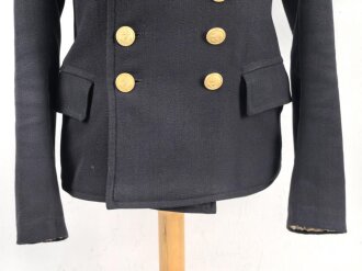 Kriegsmarine,  dunkelblauer Überzieher ( sogenannter Collani ) für einen Artilleriegefreiten. Eigentumstück in gutem Zustand, die Effekten höchstwahrscheinlich original vernäht