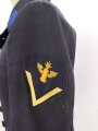 Kriegsmarine,  dunkelblauer Überzieher ( sogenannter Collani ) für einen Artilleriegefreiten. Eigentumstück in gutem Zustand, die Effekten höchstwahrscheinlich original vernäht