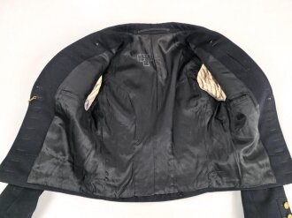 Kriegsmarine,  dunkelblaue Paradejacke für einen Bootsmann. Kammerstück von 1936, die Effekten original vernäht. Guter Zustand
