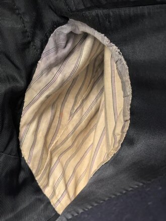 Kriegsmarine,  dunkelblaue Paradejacke für einen Bootsmann. Kammerstück von 1936, die Effekten original vernäht. Guter Zustand