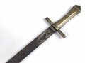 Schweiz, Weidmesser ohne Scheide , aufpflanzbar, Kantonal, Arretierungsfeder fehlt, Gesamtlänge 65,7 cm, Messinggriff mit gerader Parierstange   glatte Keilklinge beschliffen mit Rostspuren,  Schlitzlänge für die Gewehraufnahme 7cm, Schlitzbreite 3,5 mm