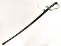 " Kavallerie Regiment 18"  Säbel von Eickhorn Solingen mit beidseitig geätzter Klinge. Sehr seltene Ausführung mit zwei Adlern. Die Klinge in sehr gutem Zustand, die Scheide original lackiert mit diversen Altersspuren, die Griffwicklung teilweise defekt.