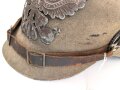 Preussen 1. Weltkrieg, feldgraue Pickelhaube für Mannschaften aus Filz. Leicht getragenes Stück mit diversen kleineren Beschädigungen