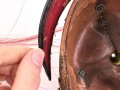 Bayern, Pickelhaube für einen Fähnrich oder einjährig Freiwilligen der Feldartillerie mit rotem Paradebusch. Das Seidenripsfutter fehlt, sonst guter Gesamtzustand