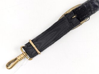 Teil eines Gehänge zum Dolch für Offiziere der Kriegsmarine. Neuzeitlich zusammengebaut unter Verwendung zum Teil originaler Teile. Länge des Bandes 28,5cm