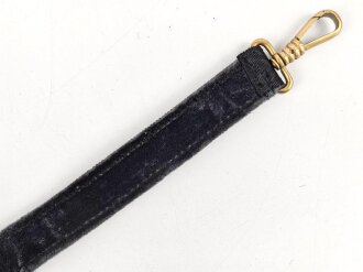 Teil eines Gehänge zum Dolch für Offiziere der Kriegsmarine. Neuzeitlich zusammengebaut unter Verwendung zum Teil originaler Teile. Länge des Bandes 28,5cm