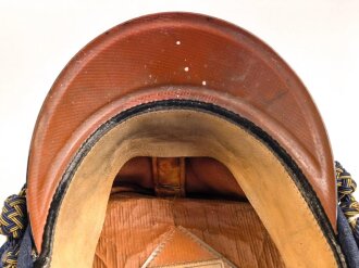 Schirmmütze für einen Angehörigen der Deutschen Reichsbahn. Ungereinigtes Stück, Kopfgrösse gemessen 56