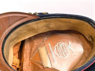 Schirmmütze für einen Angehörigen der Deutschen Reichsbahn. Ungereinigtes Stück, Kopfgrösse gemessen 56