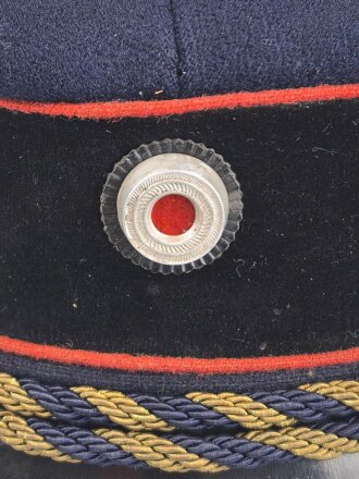 Schirmmütze für einen Angehörigen der Deutschen Reichsbahn. Ungereinigtes Stück, Kopfgrösse gemessen 56