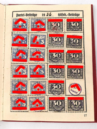 NSDAP Mitgliedsbuch eines Mannes aus Kiel. Ausgestellt 1936, Mitgliedsbeiträge von 1936 bis 1944, guter Zustand
