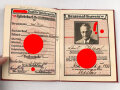 NSDAP Mitgliedsbuch eines Mannes aus Kiel. Ausgestellt 1936, Mitgliedsbeiträge von 1936 bis 1944, guter Zustand