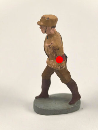 Massefigur 7cm, einen SA Mann marschierend darstellend....