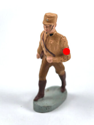 Massefigur 7cm, einen SA Mann marschierend darstellend....