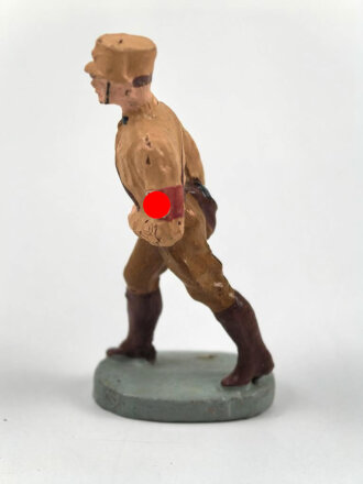 Massefigur 7cm, einen SA Mann marschierend darstellend....