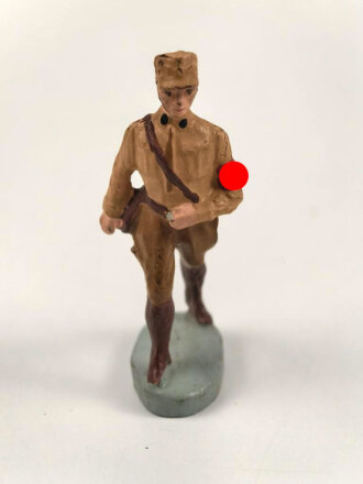 Massefigur 7cm, einen SA Mann marschierend darstellend. Original bemalt