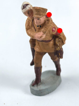 Massefigur 7cm, einen SA Mann mit Verwundetem darstellend. Original bemalt