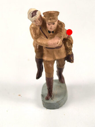 Massefigur 7cm, einen SA Mann mit Verwundetem darstellend. Original bemalt