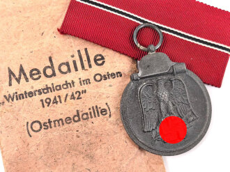 Medaille " Winterschlacht im Osten " mit Verleihungstüte des Herstellers " J.E. Hammer & Söhne, Geringswalde, Medaille ist nicht markiert