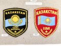 Kasachstan, Sammlung 6 Abzeichen Polizei und Militär, auf Karton getackert