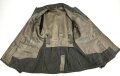 Heer, Feldbluse für Mannschaften Modell 1943. Kammerstück aus italienischem Tuch . Die Kragenspiegel höchstwahrscheinlich original vernäht, der Brustadler ergänzt. Stark getragenes Stück mit diversen älteren Reparaturstellen.