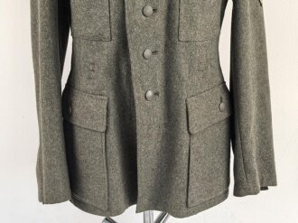 Kavallerie, Feldbluse für Mannschaften Modell 1943. Kammerstück in sehr gutem Zustand, der Brustadler neuzeitlich vernäht